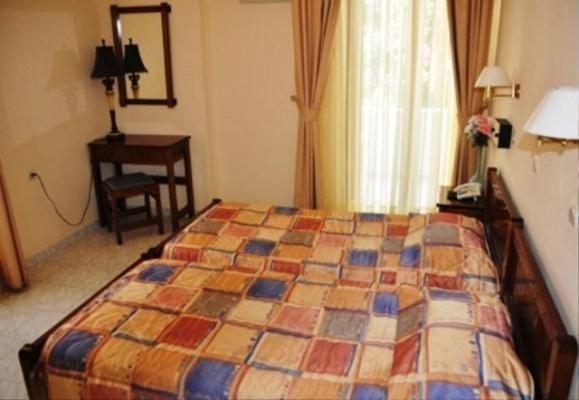 Odyssey Hotel Apartments Kárpatos Habitación foto